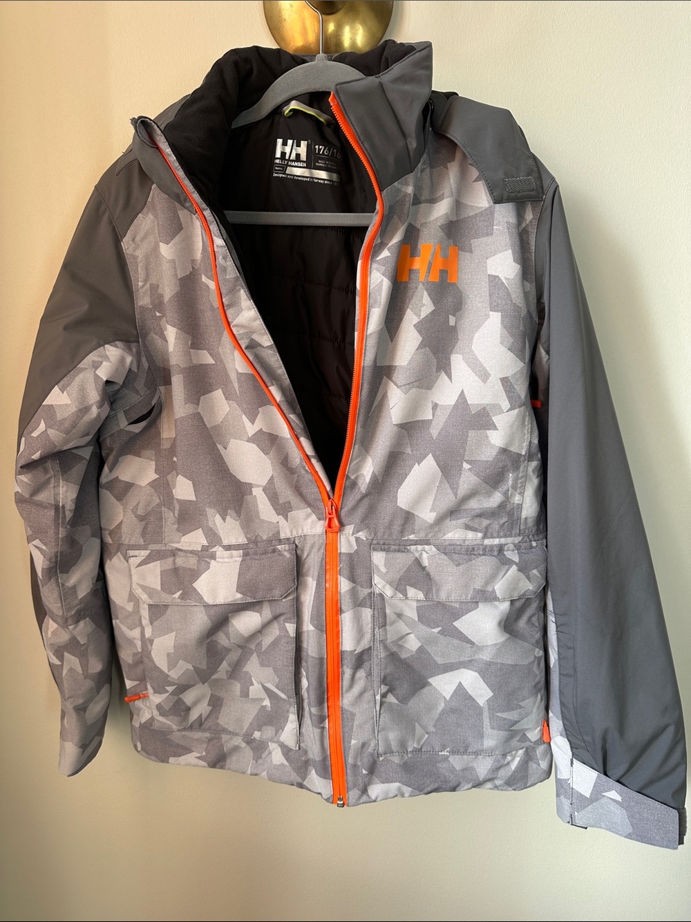Helly Hansen Kids Gray Camo Ski Jacket with Orange Accents